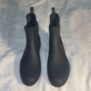 Used rain boots by Aldo